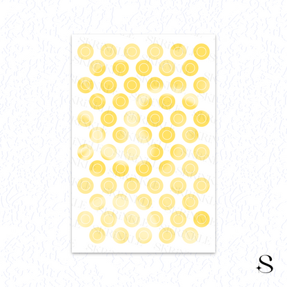 Sheet of yellow circular cute journal stickers on a white background