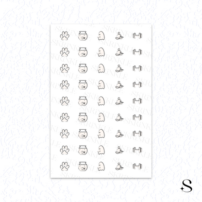 Sheet of black line art cute journal stickers with various designs on a white background