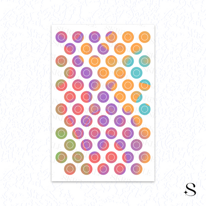 Colorful circular cute journal stickers on a white background