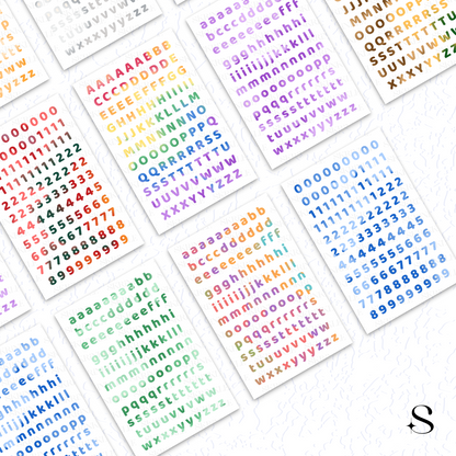 Colorful alphabet and number cute journal stickers on a white background