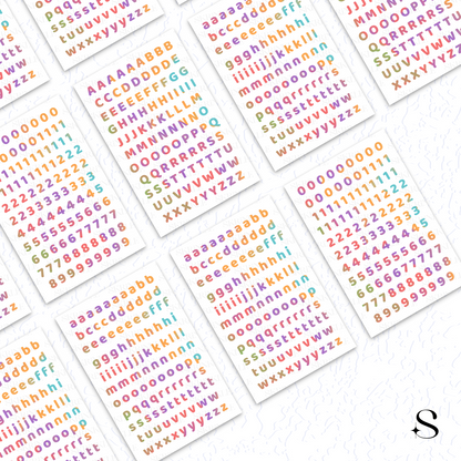 Colorful alphabet and number cute journal stickers on white background